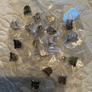 Set of 25 Silver 5 YEARS ANNIVERSARY pins with butterfly clasp.